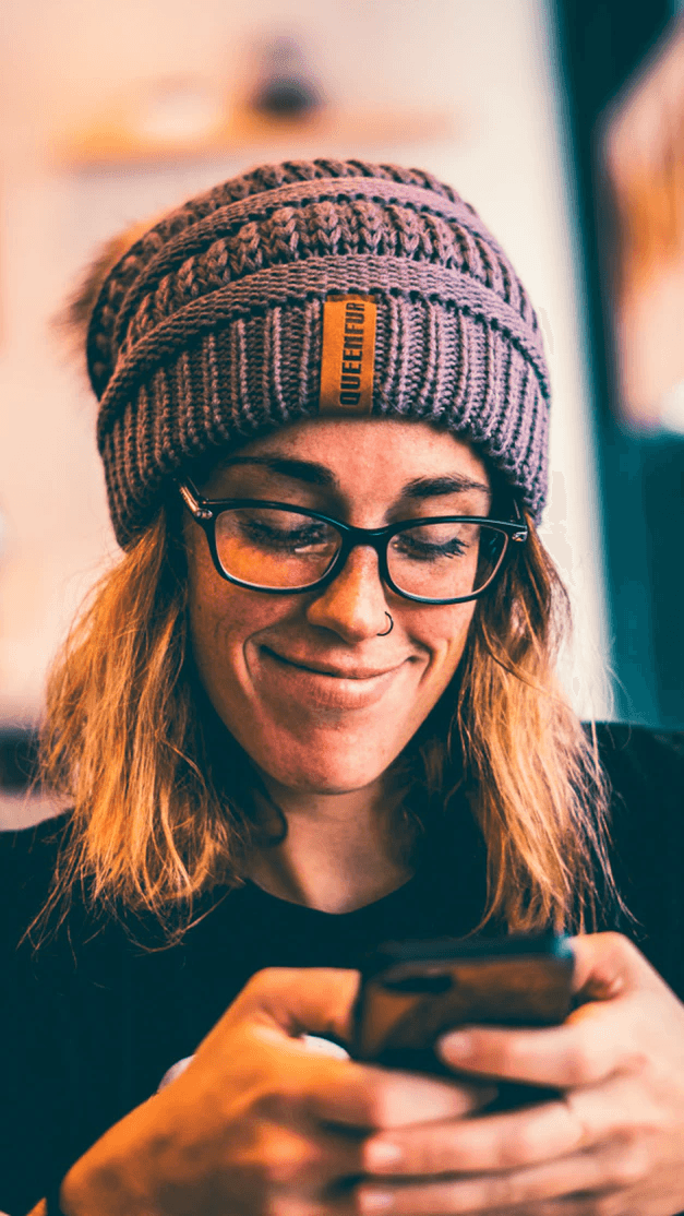 Woman using Passport Studio on her phone.